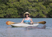 Photo of woman kayaking in Florida.